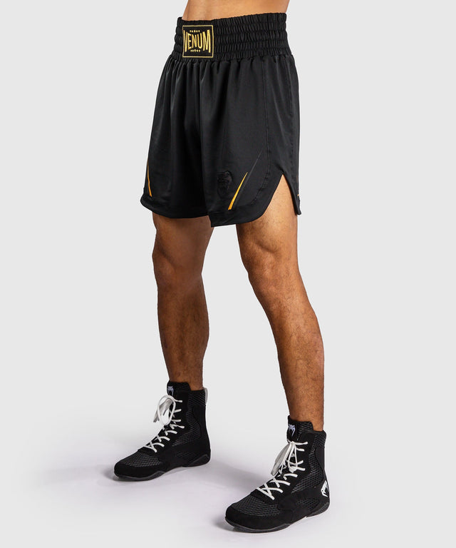 Pantaloncini da boxe Venum G-Core – Nero/Oro
