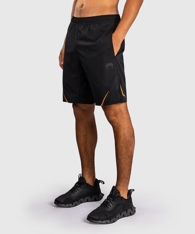 Pantaloni scurți de antrenament Venum G-Core – Negru/Aur