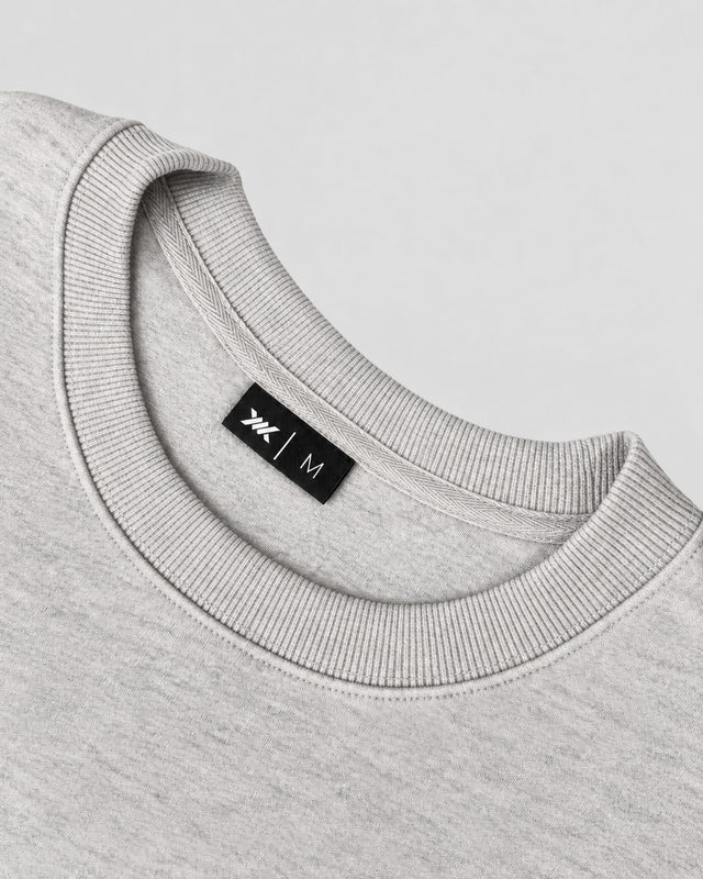 Sudadera Caged Varsity – Gris Melange