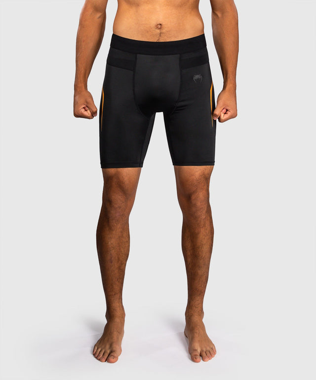 Mallas de compresión Venum G-Core – Negro/Oro