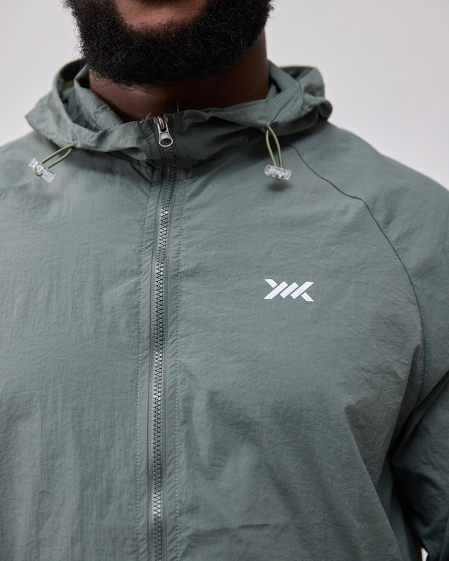 Caged Hooded Ultralight Windbreaker – Menthe