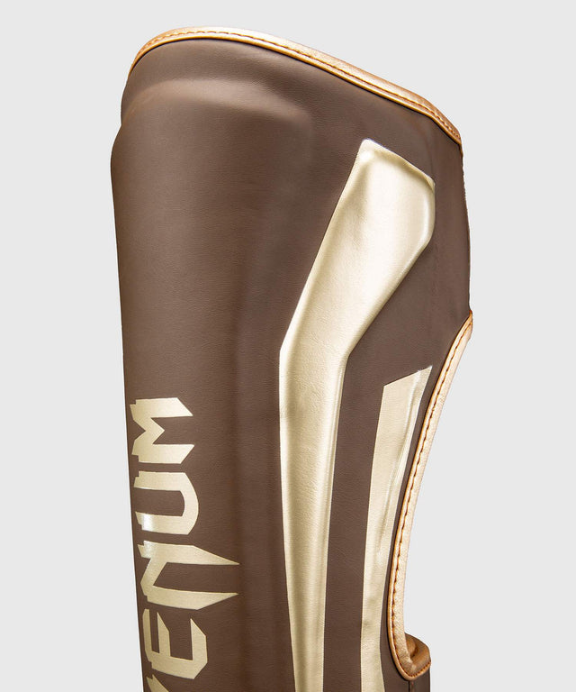 Espinilleras Venum Elite – Marrón oscuro
