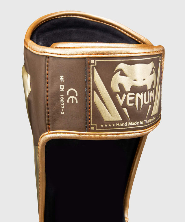 Espinilleras Venum Elite – Marrón oscuro