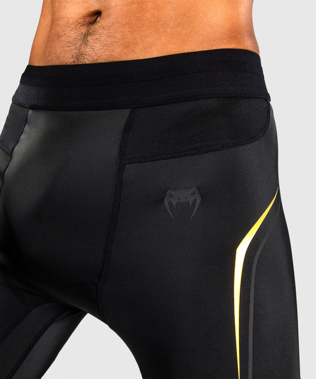 Mallas de compresión Venum G-Core – Negro/Oro
