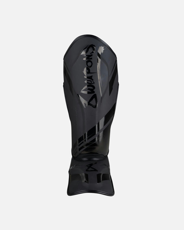 8 WEAPONS Skinnebensbeskyttere Shift – Sort