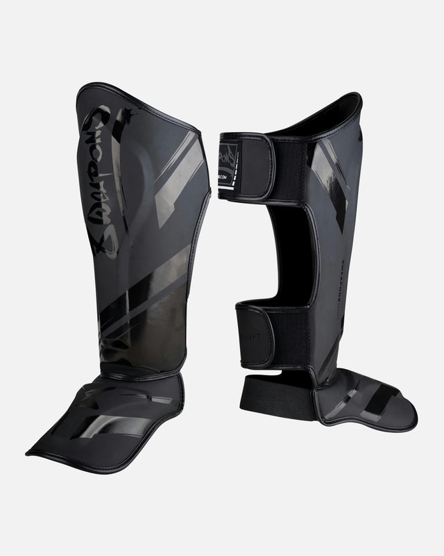 8 WEAPONS Skinnebensbeskyttere Shift – Sort