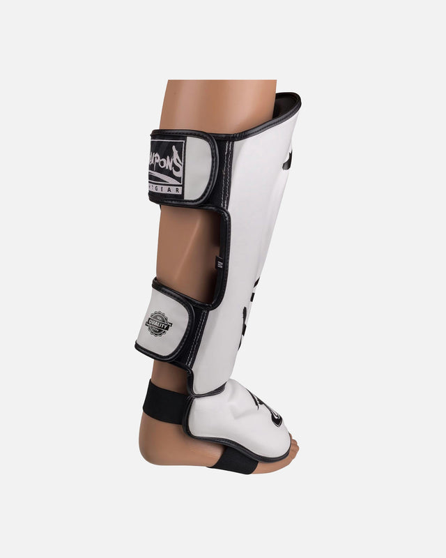 Espinilleras 8 WEAPONS Unlimited 2.0 – Blanco/Negro