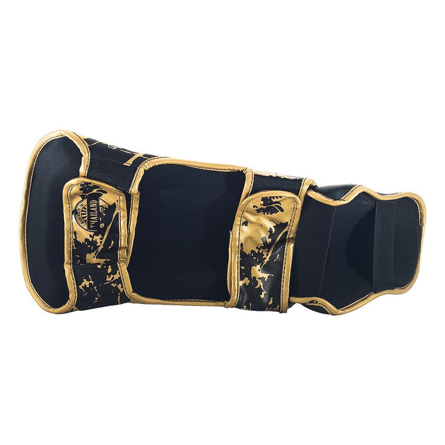 Booster Benskydd Marble Barn - Svart/Guld