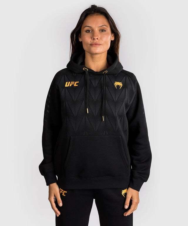 Sudadera con capucha UFC Venum Zenith para mujer – Negro/Oro