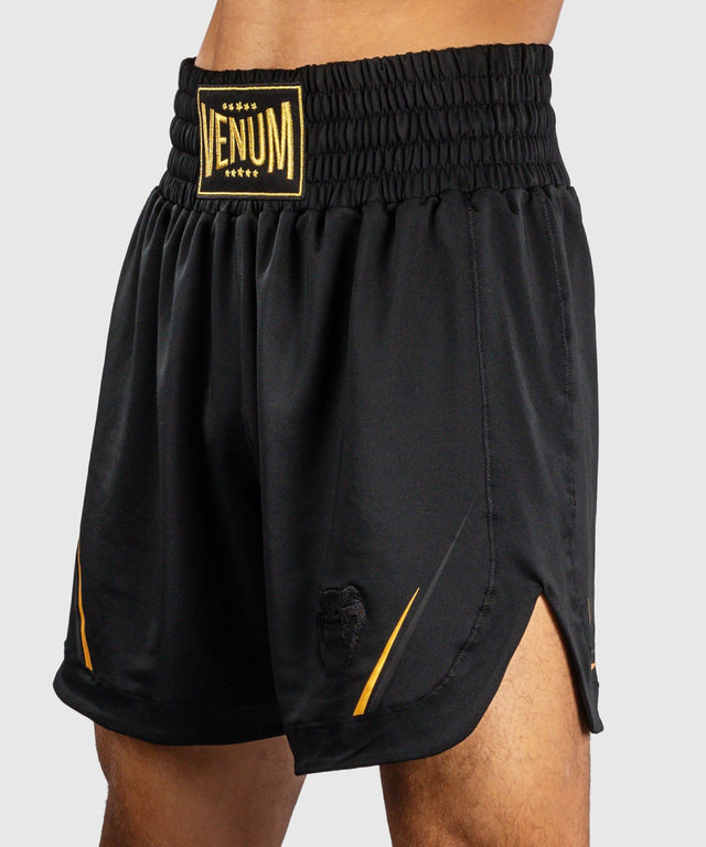 Pantaloncini da boxe Venum G-Core – Nero/Oro