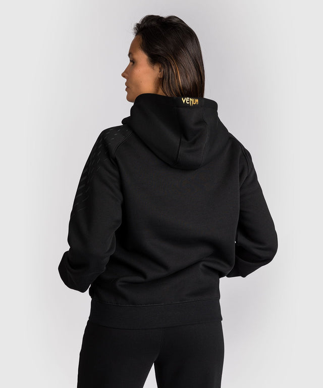 Sudadera con capucha UFC Venum Zenith para mujer – Negro/Oro