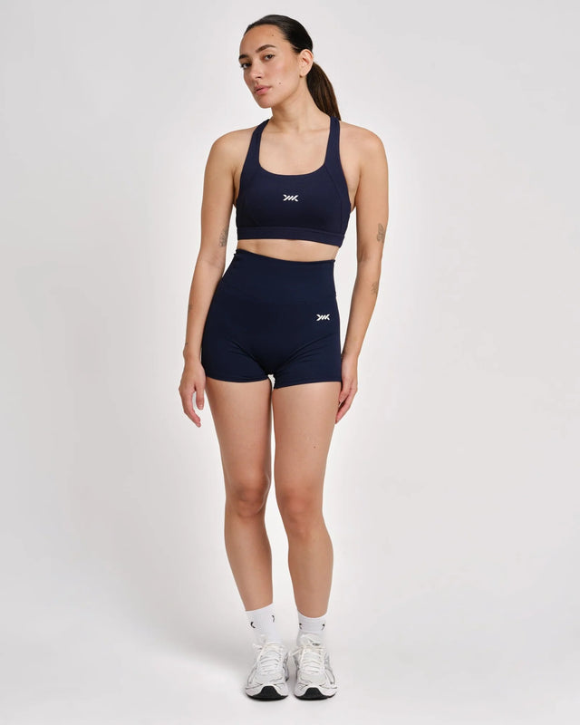 Biustonosz sportowy Caged Essential – Granatowy