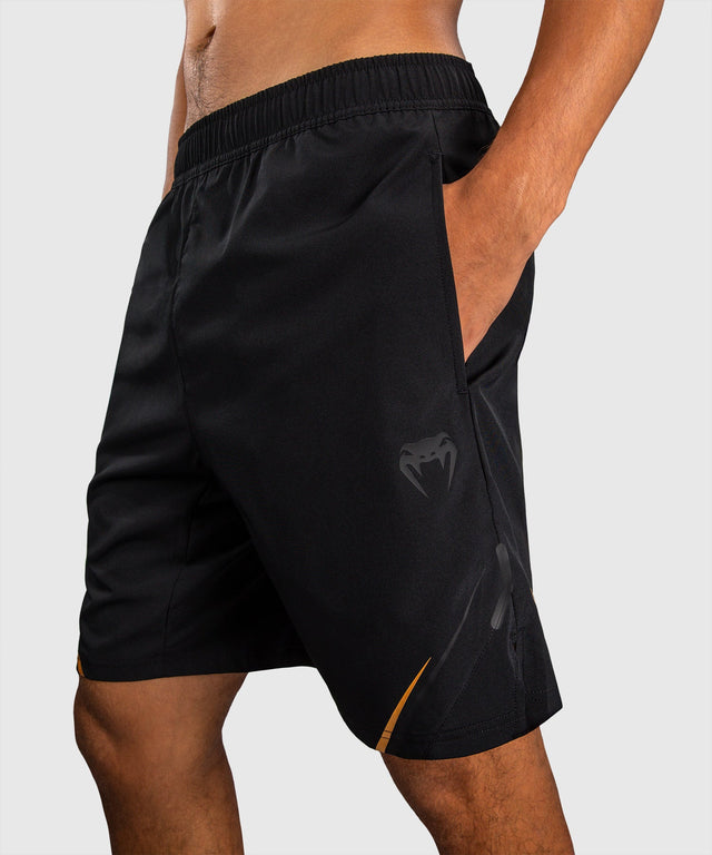 Pantaloni scurți de antrenament Venum G-Core – Negru/Aur