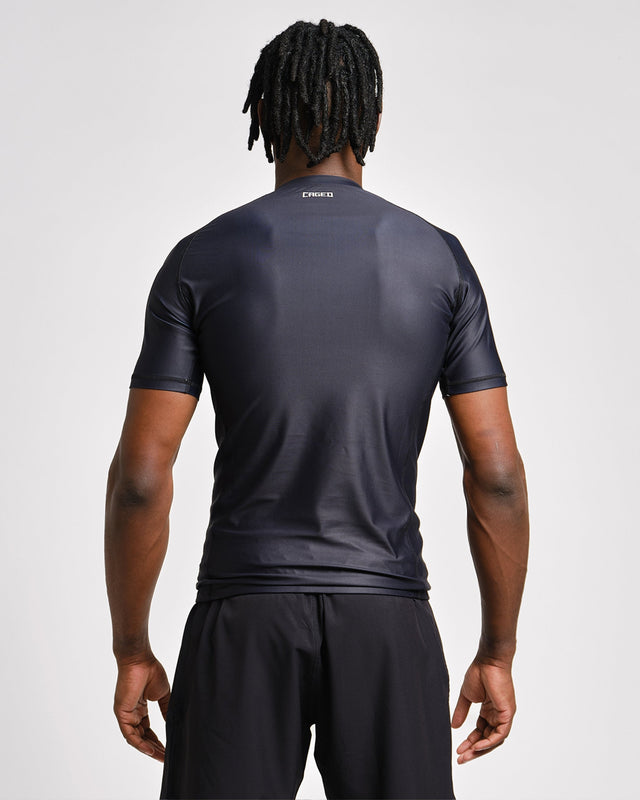 Rashguard Caged Tactical Maniche Corte – Nero