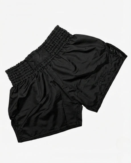 Pantaloncini Muay Thai Caged Classic – Nero/Nero flat lay