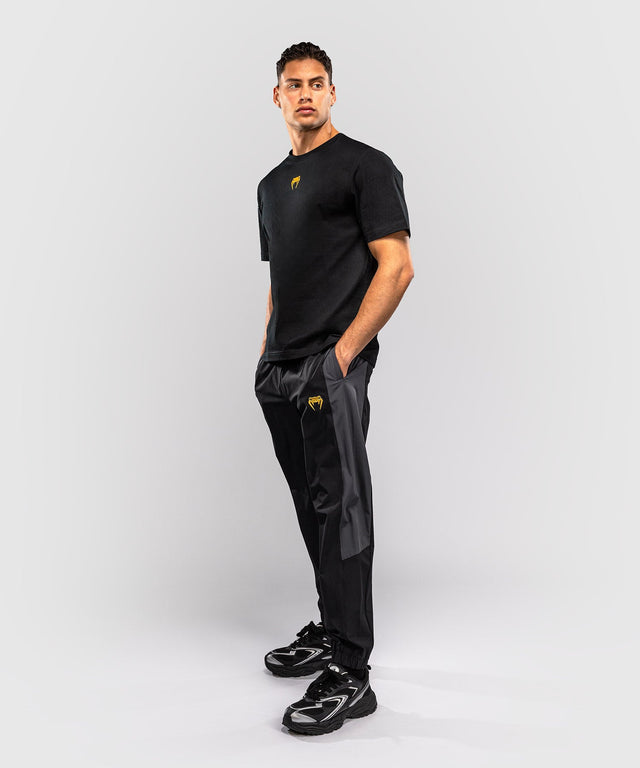Venum T-Shirt Essential – Black/Gold