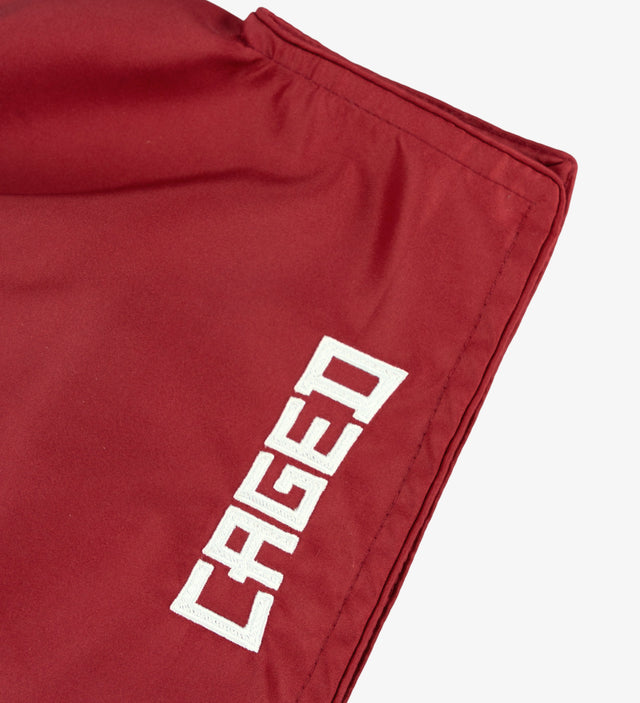 Pantaloncini Muay Thai Caged Classic – Rosso/Bianco donna