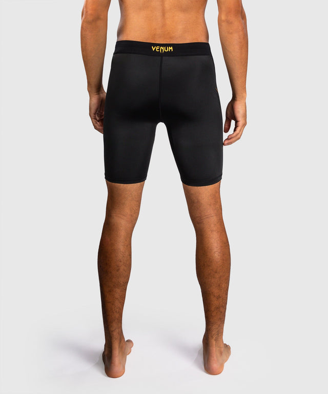 Mallas de compresión Venum G-Core – Negro/Oro