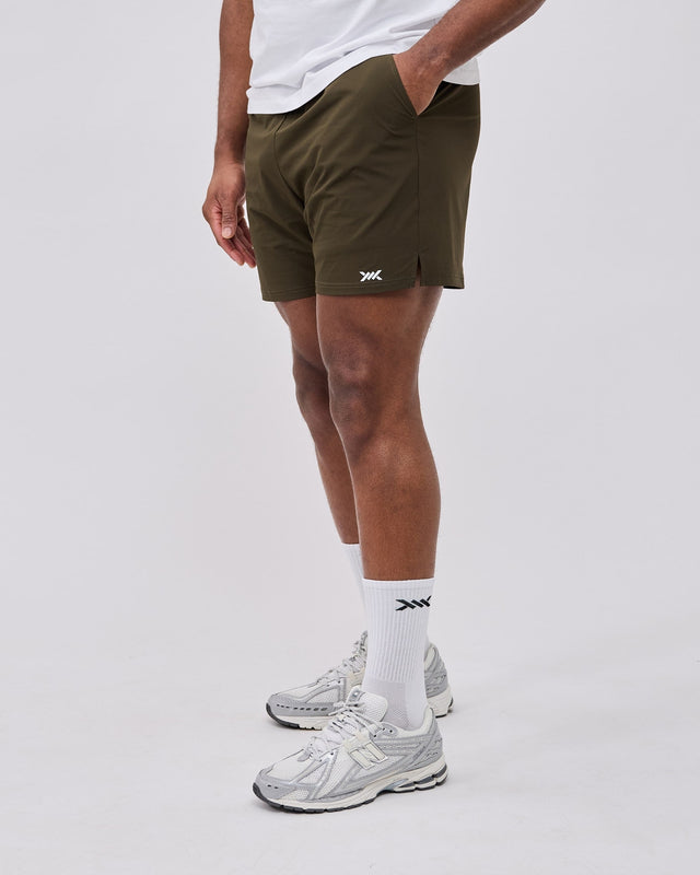 Pantaloni scurți de antrenament Caged Essential – Verde deschis