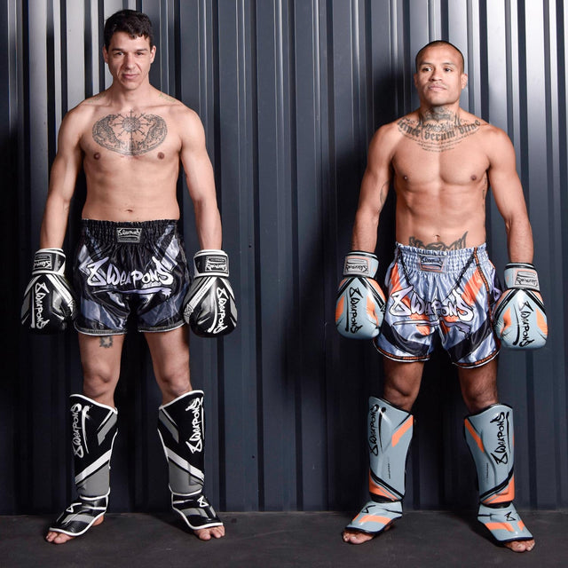 8 WEAPONS Muay-Thai-Shorts Shift – Eisgrau/Orange