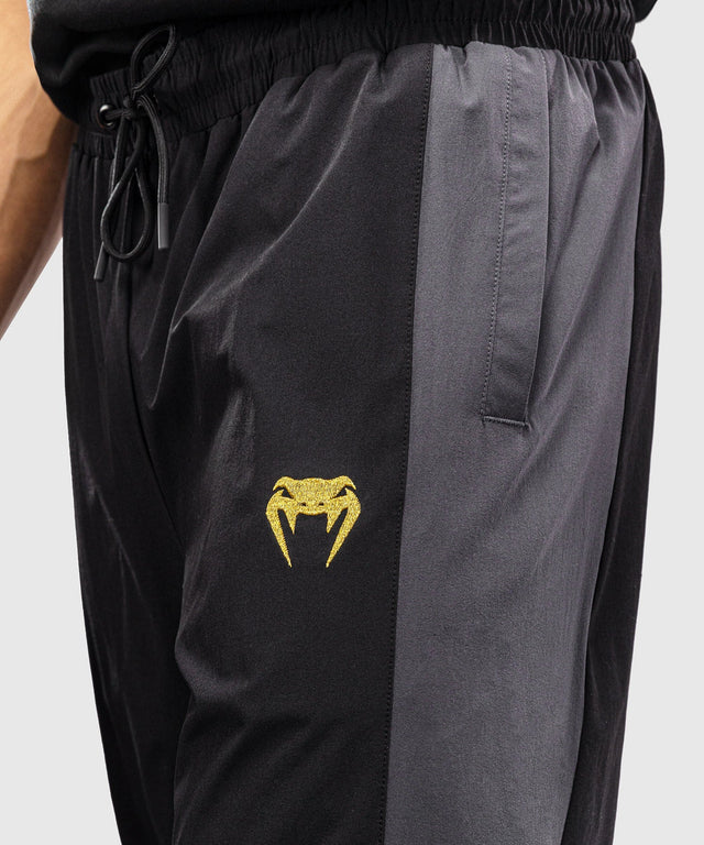 Pantaloni de antrenament Venum Vectra – Negru/Auriu