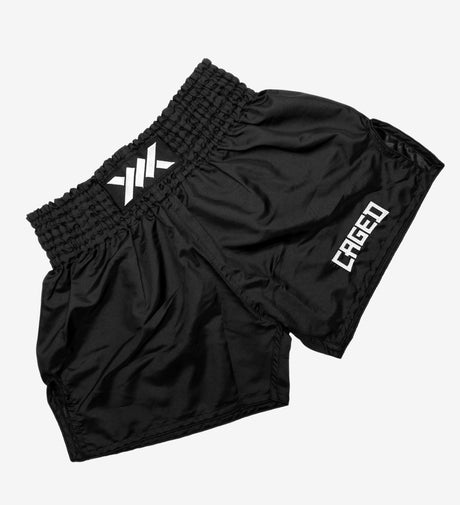 Pantaloncini Muay Thai Caged Classic – Nero/Bianco donna