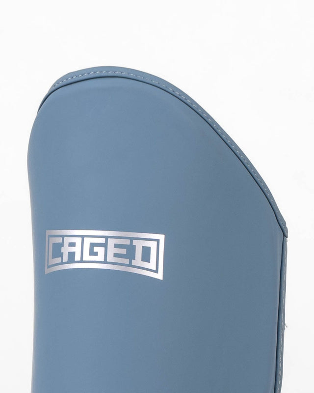 Caged Skinnebensbeskyttere Shadow - Midnight Blue