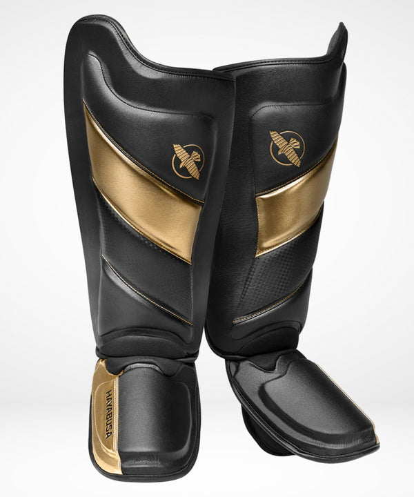 Caneleiras Hayabusa T3 – Preto/Ouro