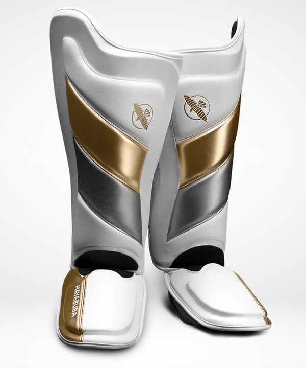 Caneleiras Hayabusa T3 – Branco/Ouro
