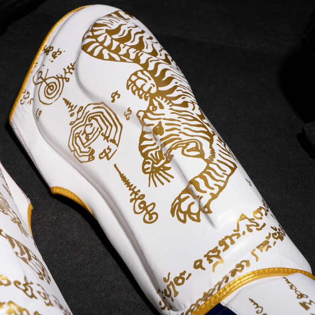 Paratibie Phantom Athletics Muay Thai – Bianco/Oro