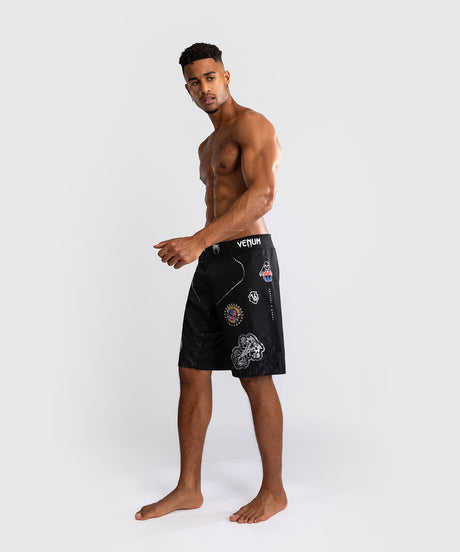Calções de MMA Venum x TEKKEN 8 – Paul Phoenix – Preto