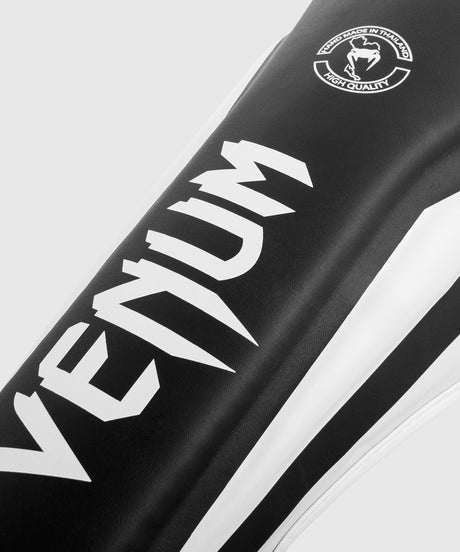 Tibiere Venum Elite – Negru/Alb