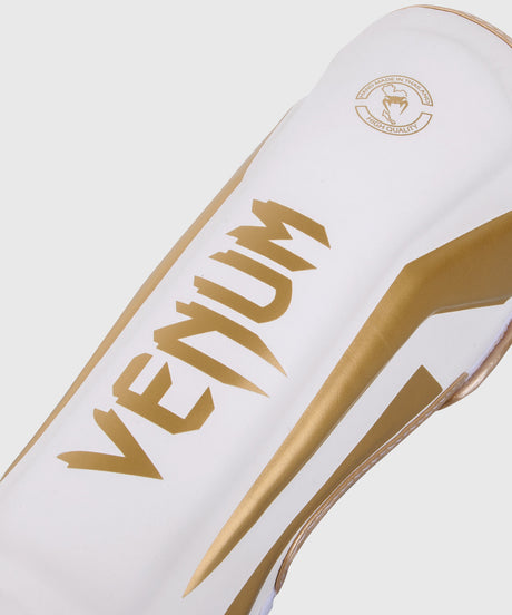 Tibiere Venum Elite – Alb/Auriu
