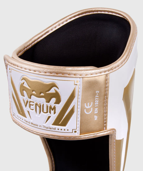Tibiere Venum Elite – Alb/Auriu