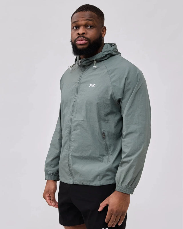 Caged Hooded Ultralight Windbreaker – Menthe