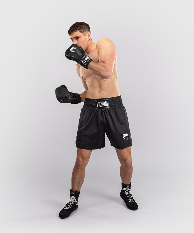 Pantaloncini da boxe Venum Stealth – Nero/Bianco