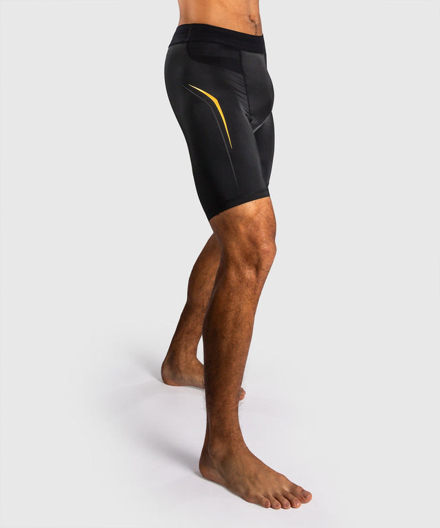 Mallas de compresión Venum G-Core – Negro/Oro