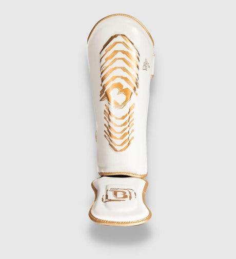 Espinilleras Booster Elite V2 – Blanco/Oro