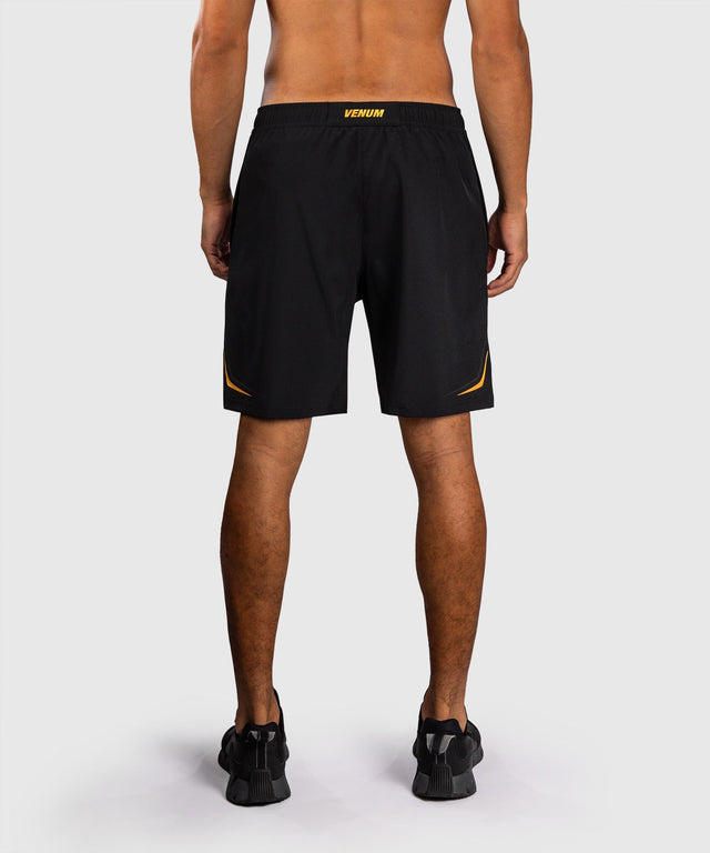 Pantaloni scurți de antrenament Venum G-Core – Negru/Aur