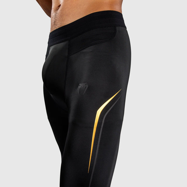 Venum Compression Shorts G-Core – Black/Gold