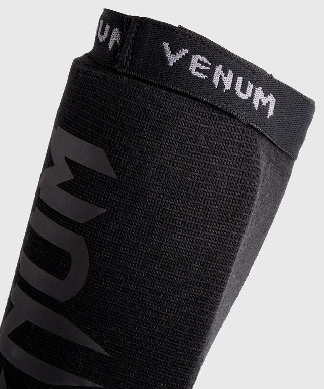 Protège-tibias Venum Kontact sans pied – Noir/Noir