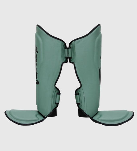 Paratibie da kickboxing Fairtex FXB – Verde militare/Nero