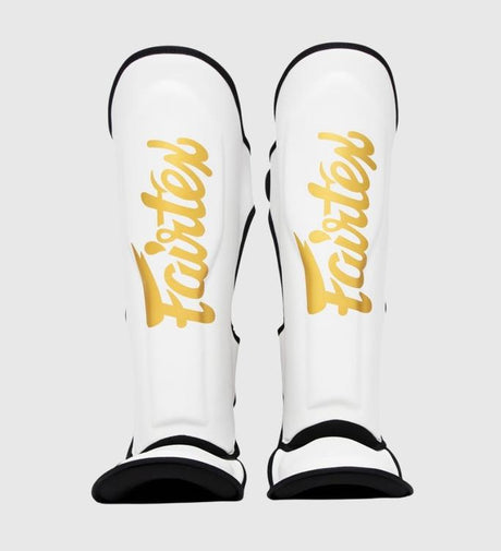 Paratibie da kickboxing Fairtex FXB – Bianco/Oro – Paratibie da kickboxing