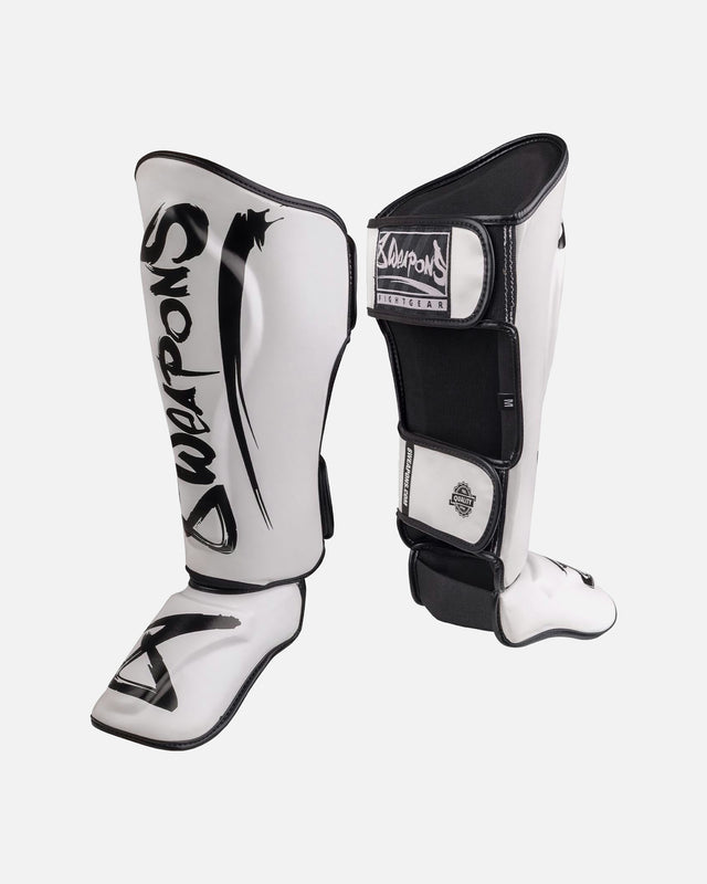 Espinilleras 8 WEAPONS Unlimited 2.0 – Blanco/Negro