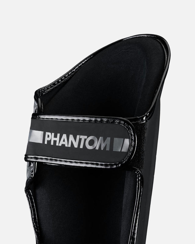 Ochraniacze na piszczele Phantom Athletics APEX Striking – Czarne/Szare