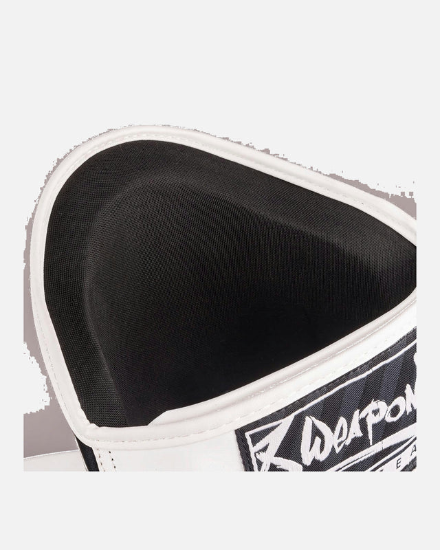 Espinilleras 8 WEAPONS Unlimited 2.0 – Negro/Blanco
