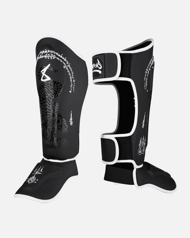 8 WEAPONS Shin guards Sak Yant Big Tiger – Black