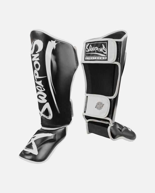 Espinilleras 8 WEAPONS Unlimited 2.0 – Negro/Blanco