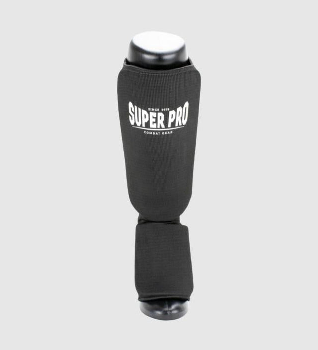 Super Pro Caneleiras Defender – Preto/Branco – Caneleiras