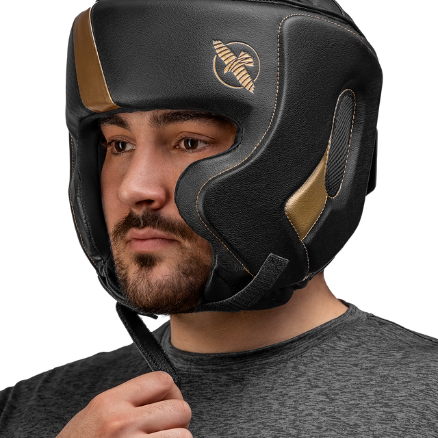 Hayabusa Kopfschutz T3 mit Wangenschutz – Schwarz/Gold